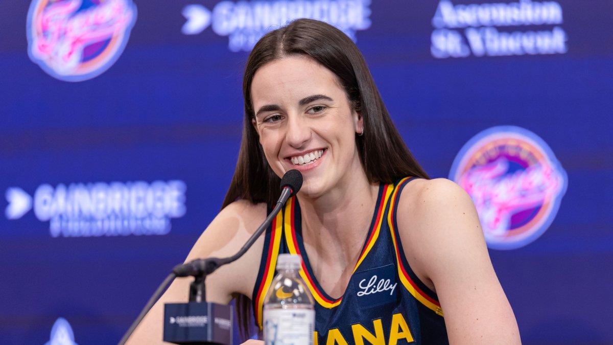 Caitlin Clark impresses with 21 points in pro debut as Fever fall ...